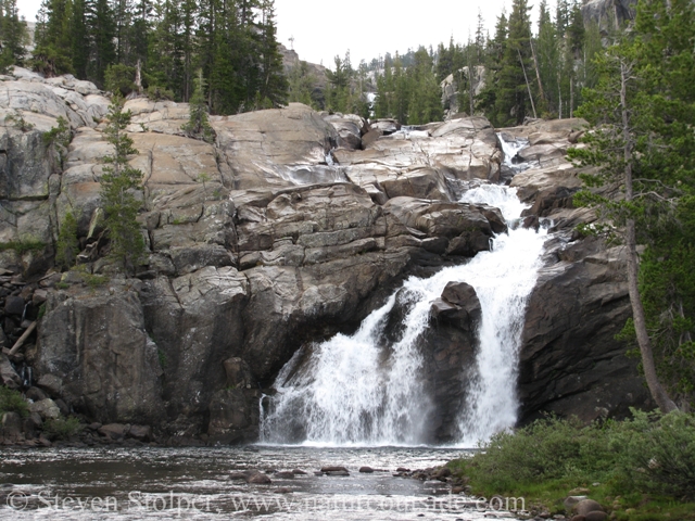 Waterfall and swimming hole alongside camp.