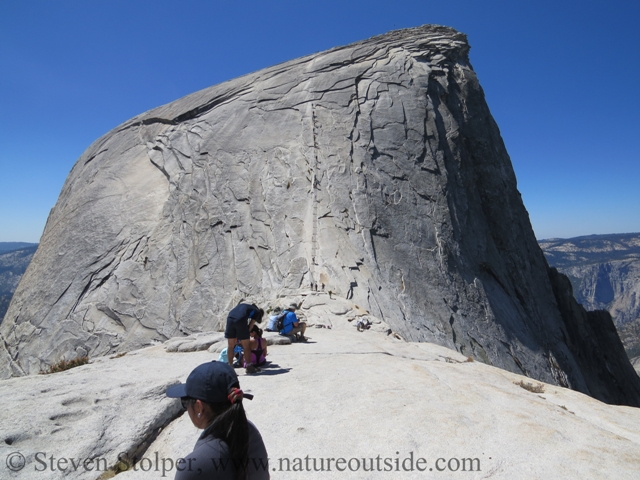 Half Dome in the distance with the cables ahead.