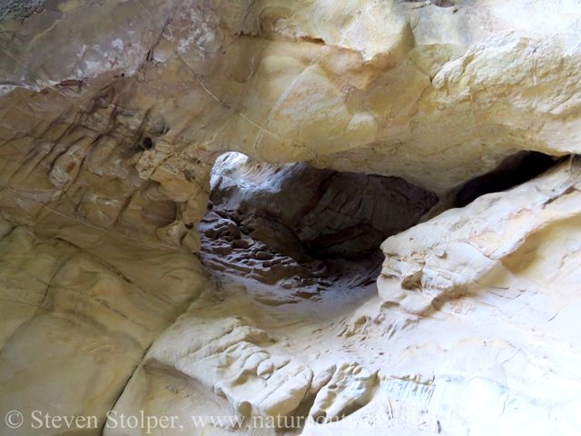 Skylight leading to ground in front of the top cave.