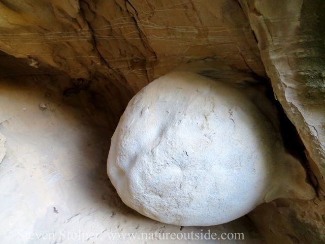 A closer look at the globe and the veins of quartz in the wall above.