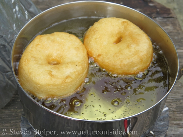 The outside of the doughnuts turn an inviting golden-brown.