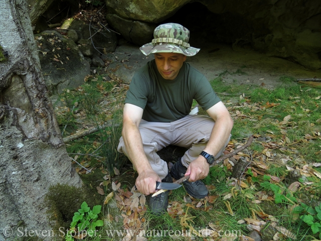 carving in a sitting position