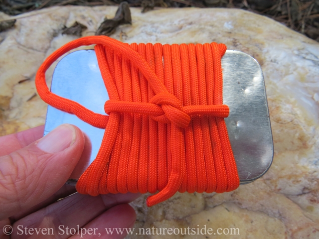 personal survival kit (PSK) with orange paracord
