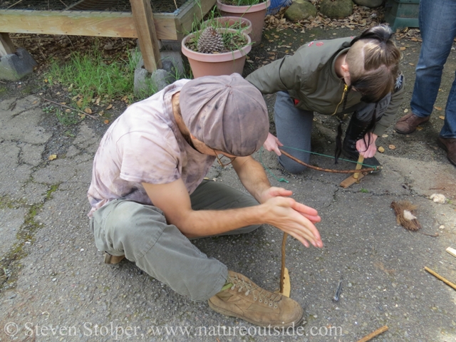 Students practicing hand drill and bow drill