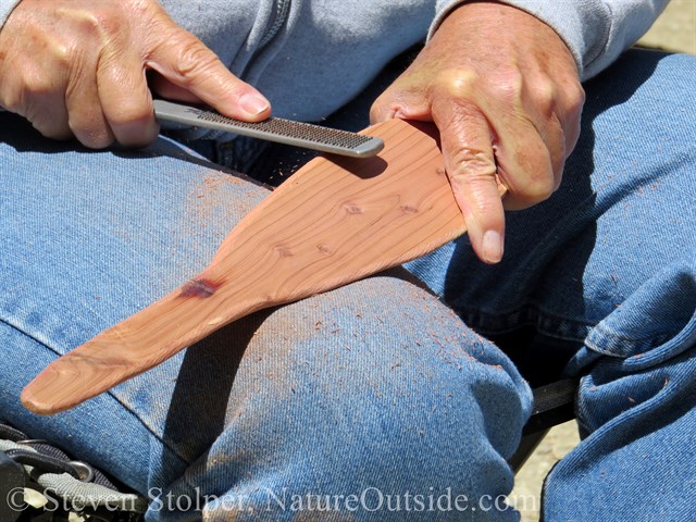 filing edge of cedar ceremonial canoe paddle