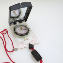 compass with mirror and title