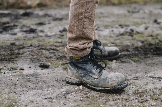 black work boots dusty