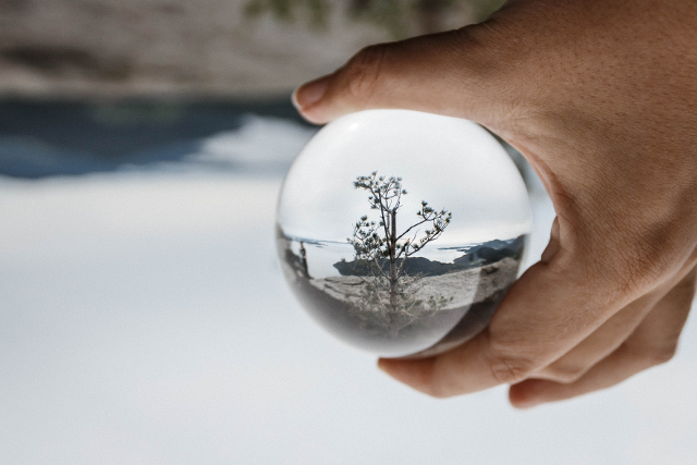 hand holding crystal ball