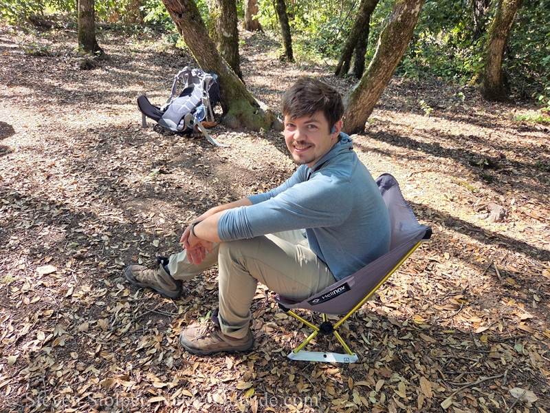 man sitting in Helinox Chair Zero